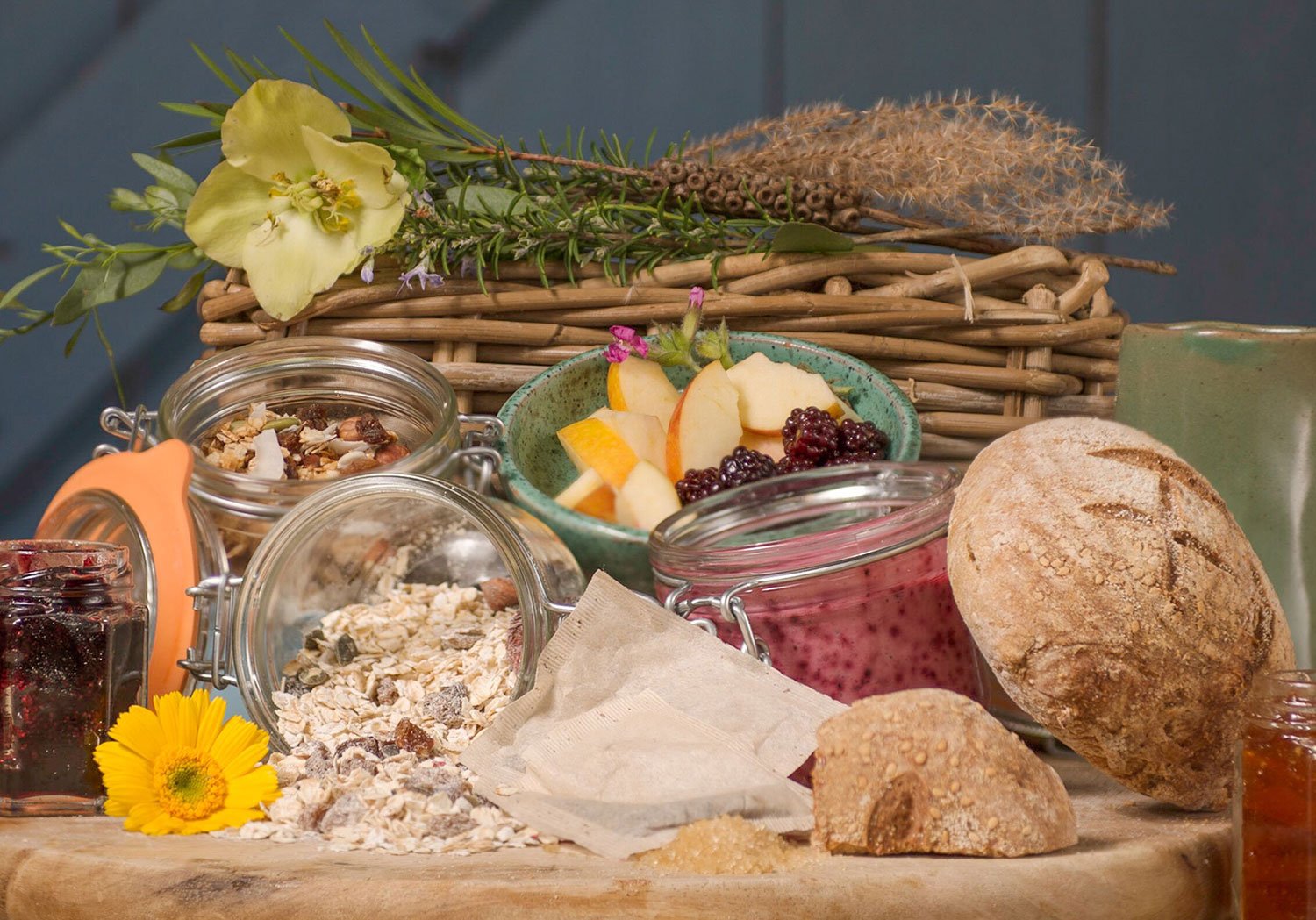 Taste of Cotna Eco Retreat more raw vegan breakfast hamper for holiday guests with home-made muesli, fruit kefir, home-made jam, organic home-grown fruit, sourdough bread and Cornish apple juice from the Roseland